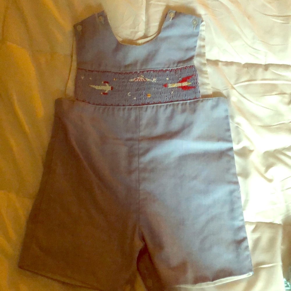 Toddler boys jumper with embroidered rockets.